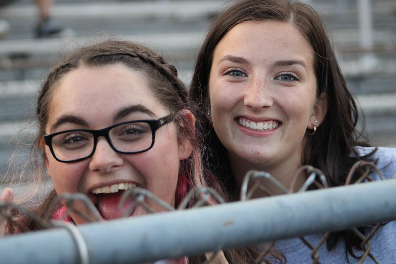 Anna Inzeo and Hailey Powers enjoy the game